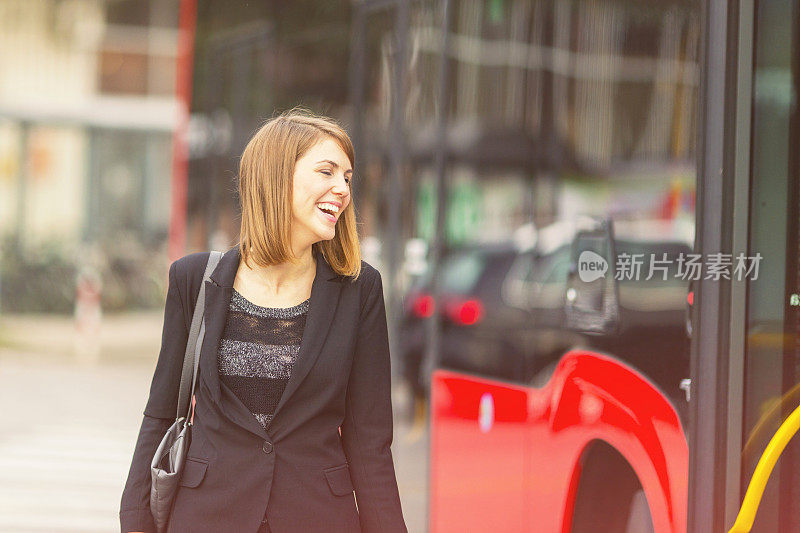 Young woman on the bus station